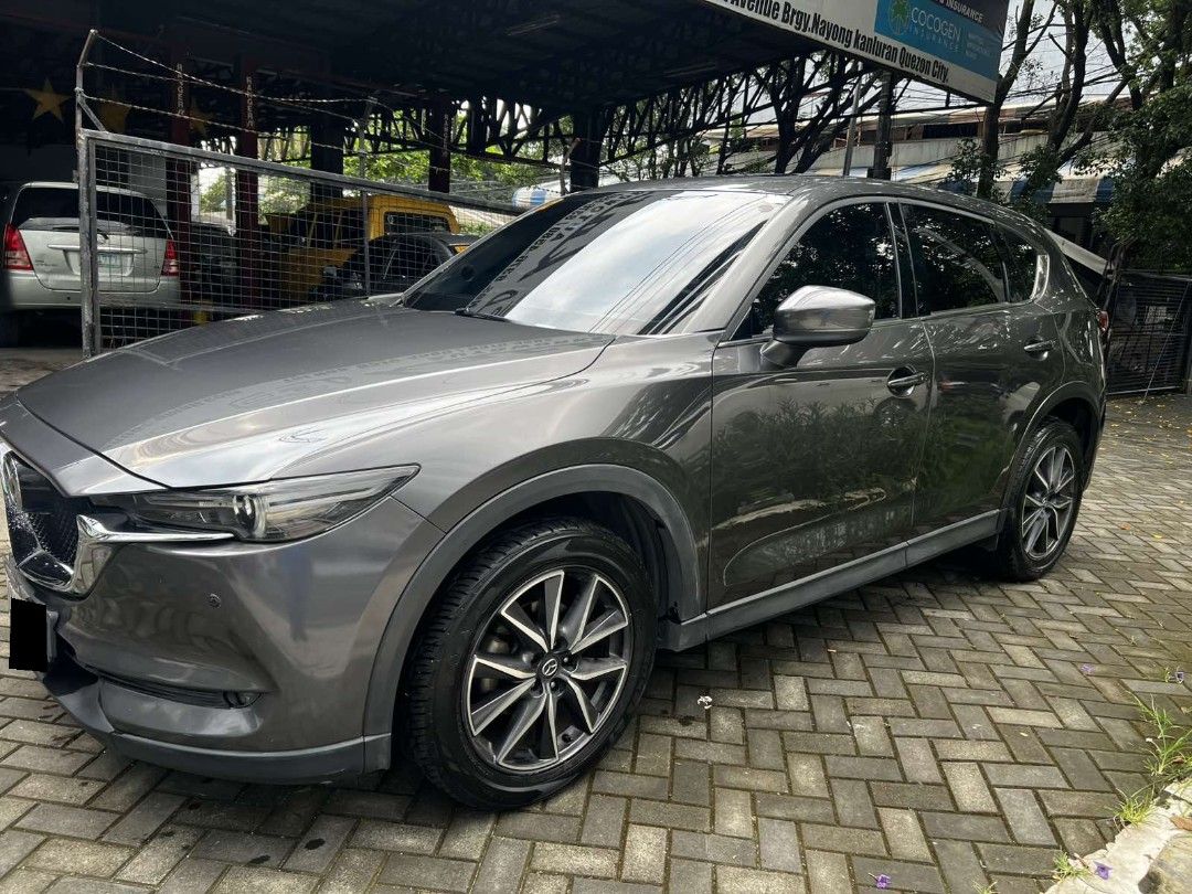 Mazda CX-5 2.2 AWD 6AT Diesel (A) (Category: Used Cars) located in Quezon City. Submitted by nathaniel.adam (Listing ID 1470243400, Image 2). Description: 2019 Mazda CX-5 2.2 AWD Diesel AT 💰 ₱820,000.00 Slightly Negotiable 📍 Quezon City - First owned, locally purchased - 34,708 miles (~55,857 km) - Machine Gray, black leather interior - Fully paid, complete OR/CR, registered 2026 - Regularly maintained; last PMS Oct 2026 - Rack & pinion replace