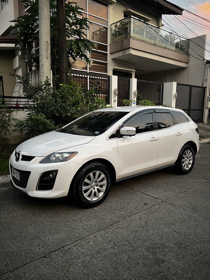 Mazda CX-7 2.5 (A) (Category: Used Cars) located in Marikina City. Submitted by heatcheckk (Listing ID 1470282228, Image 2). Description: 2010 Mazda CX-7 2.5L Gasoline Details: * 2.5L Gasoline Engine * Automatic Transmission with Tiptronic * Engine and Transmission in Good Condition * Cold Air Conditioning * Equipped with Aftermarket Apple CarPlay * Newly scanned no error codes & legit odo * Acquired from 1st Owner * Complete and Clean Documents 