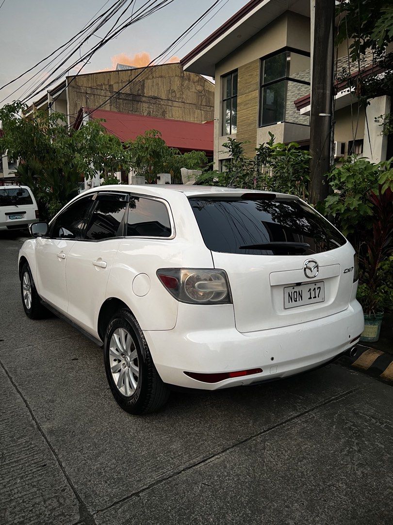 Mazda CX-7 2.5 (A) (Category: Used Cars) located in Marikina City. Submitted by heatcheckk (Listing ID 1470282228, Image 3). Description: 2010 Mazda CX-7 2.5L Gasoline Details: * 2.5L Gasoline Engine * Automatic Transmission with Tiptronic * Engine and Transmission in Good Condition * Cold Air Conditioning * Equipped with Aftermarket Apple CarPlay * Newly scanned no error codes & legit odo * Acquired from 1st Owner * Complete and Clean Documents 