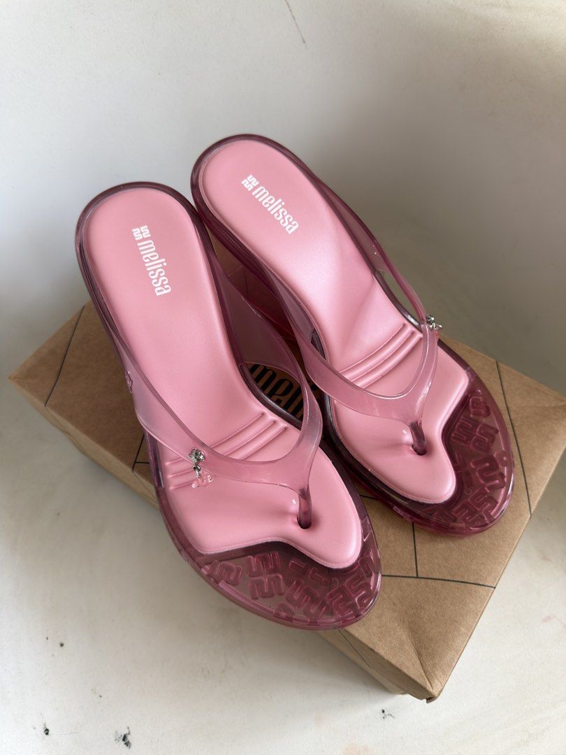Melissa Nabeela Clear Pink Wedges (Category: Flats & Sandals) located in Quezon City. Submitted by socutexx (Listing ID 1470206674, Image 2). Description: NEW Melissa Nabeela - Style: Thong wedge sandals with chunky translucent heel - Color: Clear Pink - Size: 9 US - Inclusion: Original shoe box included - Condition: Excellent/NEW RFS: too many shoes.