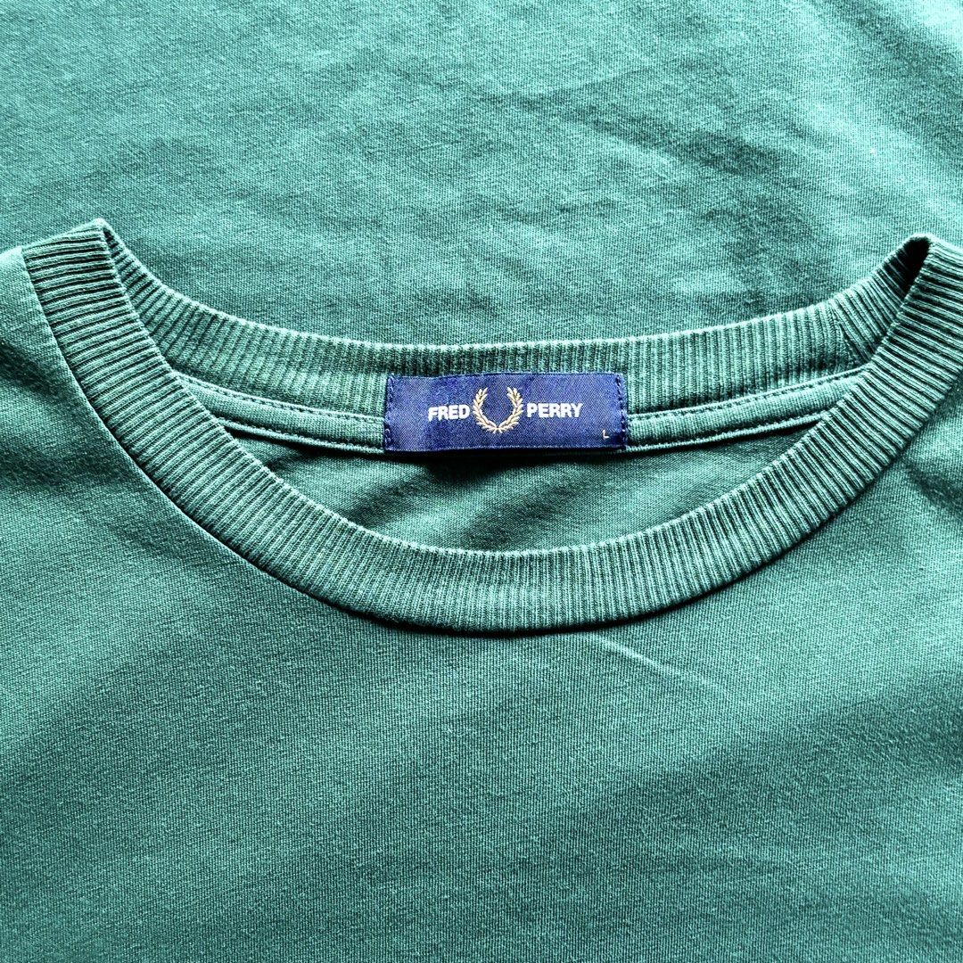 Men’s Fred Perry Tshirt (Category: Tshirts & Polo Shirts ) located in Bacolod City. Submitted by treasurehuntsv2 (Listing ID 1470169624, Image 3). Description: Condition – Excellent Color Rate –9.5/10 Flaws – None ✅ Size: Dimensions: Width – 21.5 Length – 29 Mine – 1200.