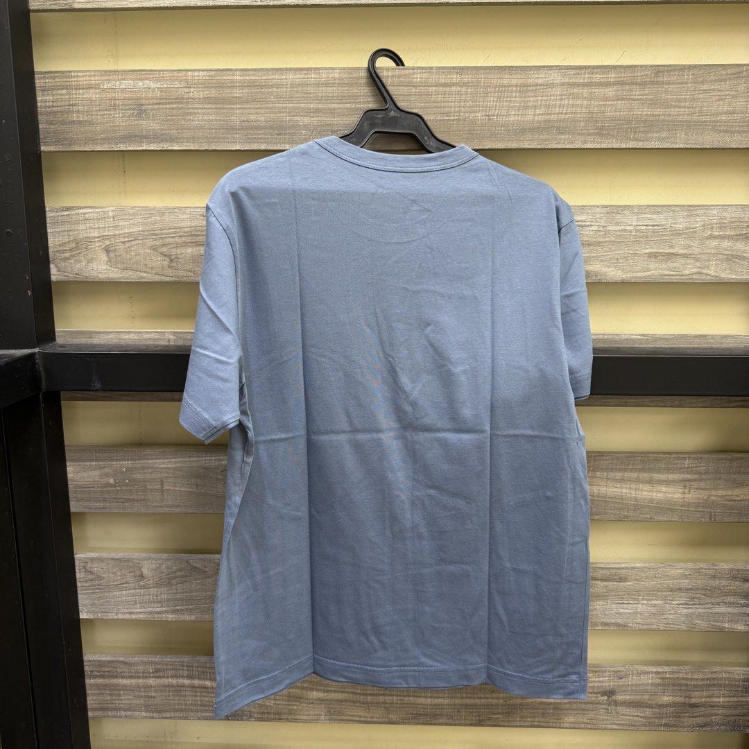 [Mens] Muji Blue T-Shirt (Category: Tshirts & Polo Shirts ) located in Mandaluyong City. Submitted by bestdressedph2025 (Listing ID 1470241021, Image 2). Description: MOP: GCash MOD: Lalamove/J&T LOCATION: Brgy. Addition Hills, Mandaluyong Discount avail for multiple items. Dimensions in Inches: Shoulder: 18 Bust: 21 Length: 26 Size on Tag: M PM for inquiries!.