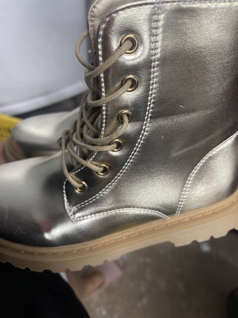 Metallic Gold Combat Boots with Chunky Sole (Category: Boots) located in Manila. Submitted by youngwater-5113 (Listing ID 1470179807, Image 2). Description: - Style: Metallic gold lace-up combat boots with tags still attached - Sole: Chunky pinkish rubber platform with heavy tread - Convenience: Functional easy wear - Details: Round toe, tonal laces, and metal eyelets - Condition: Brand new with tags .
