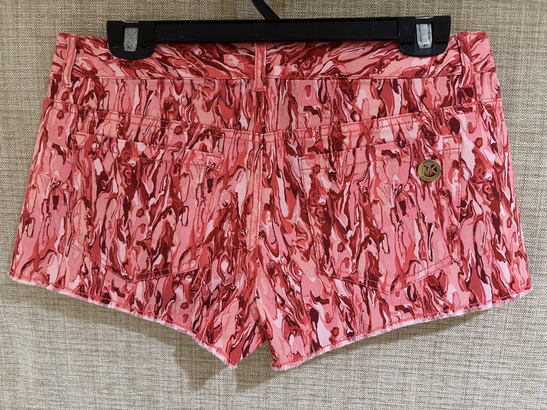 Michael Kors Denim Shorts (Category: Shorts) located in Muntinlupa City. Submitted by jane226ph (Listing ID 1470301654, Image 2). Description: Original Michael Kors Denim shorts with hot coral marble print Size Medium to Large Gold-tone hardware with MK logo branding on button and back pocket plaque Purchased in store .