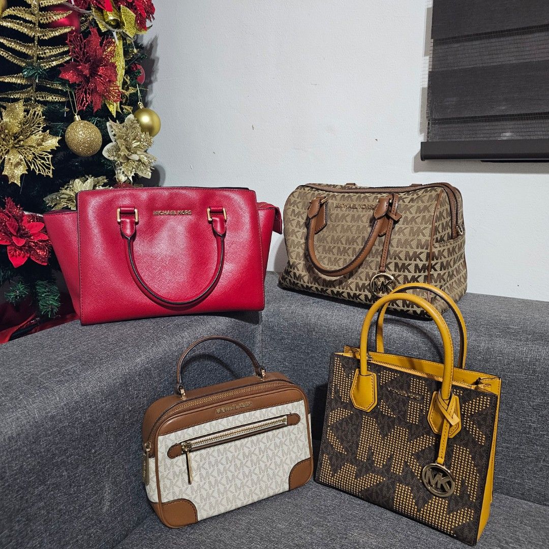 Michael Kors Handbag Bundle (Category: Luxury Bags & Wallets) located in Manila. Submitted by nicolergs (Listing ID 1470243646, Image 1). Description: The price is per bag 😊 - Lot of 4 authentic Michael Kors bags - Includes red structured satchel, brown monogram bowler with striped strap, brown & yellow perforated tote, and cream-and-tan crossbody with front zip pocket - All bags feature dual top handles - Includes detachable shoulder straps for