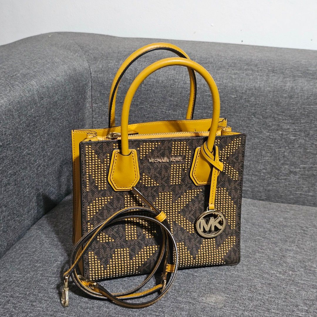 Michael Kors Handbag Bundle (Category: Luxury Bags & Wallets) located in Manila. Submitted by nicolergs (Listing ID 1470243646, Image 2). Description: The price is per bag 😊 - Lot of 4 authentic Michael Kors bags - Includes red structured satchel, brown monogram bowler with striped strap, brown & yellow perforated tote, and cream-and-tan crossbody with front zip pocket - All bags feature dual top handles - Includes detachable shoulder straps for