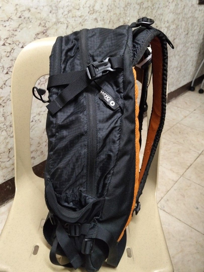 Millet Prolighter 22 Mountaineering Backpack Black Orange (Category: Backpacks) located in Abucay. Submitted by cristineca20489 (Listing ID 1470258989, Image 2). Description: - Brand: Millet Prolighter 22 - Color: Black with bright orange details - Capacity: 22 liters - Weight: Lightweight build at approx. 0.63 kg - Material: Durable ripstop fabric exterior - Features: FPP Ergo ice axe system and hydro system compatible - Interior: Clean with a d