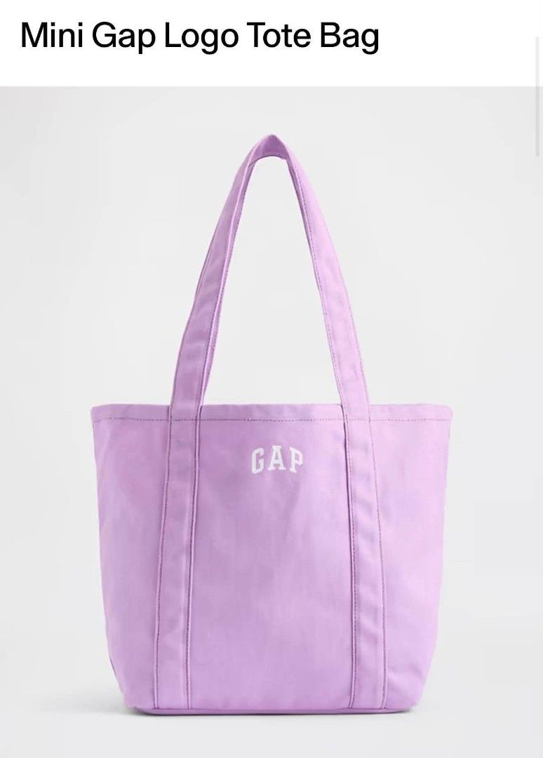 Mini Gap Logo Tote Bag Purple (Category: Tote Bags) located in Dasmarinas. Submitted by cirila1212 (Listing ID 1470172766, Image 1). Description: - Brand: Gap - Color: Purple, Red, Navy blue, light blue, yellow - Material: Sturdy canvas - Design: White embroidered GAP logo on the front - Features: Dual shoulder straps, compact size - Perfect for: Daily essentials like phone, keys, and wallet.