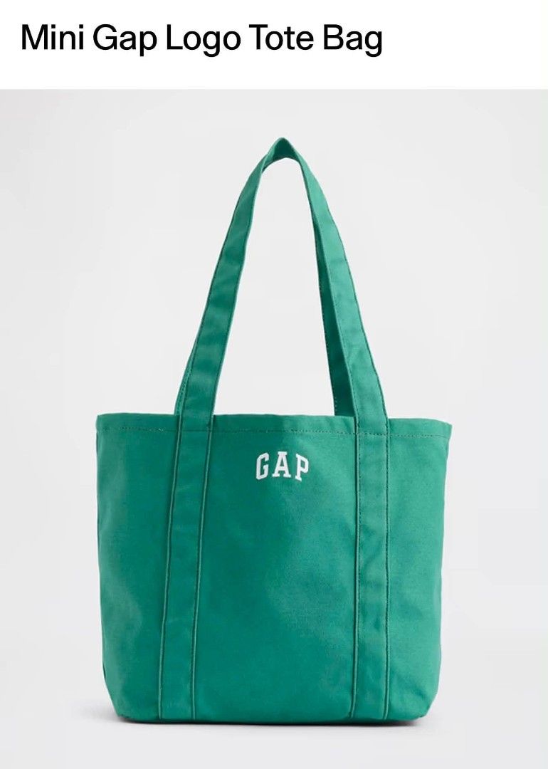 Mini Gap Logo Tote Bag Purple (Category: Tote Bags) located in Dasmarinas. Submitted by cirila1212 (Listing ID 1470172766, Image 3). Description: - Brand: Gap - Color: Purple, Red, Navy blue, light blue, yellow - Material: Sturdy canvas - Design: White embroidered GAP logo on the front - Features: Dual shoulder straps, compact size - Perfect for: Daily essentials like phone, keys, and wallet.
