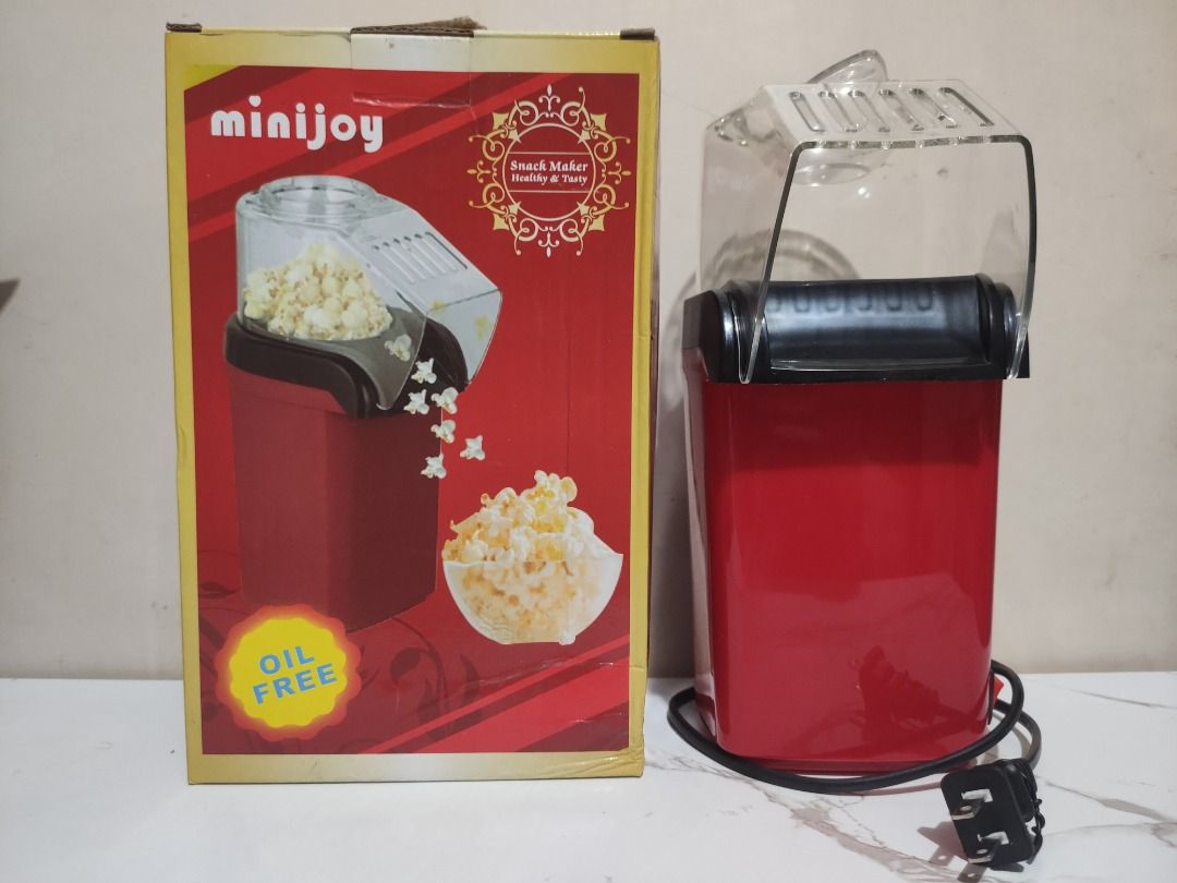 Minijoy Hot Air Popcorn Maker (Red) (Category: Coffee & Tea Tableware) located in Cainta. Submitted by jed_santos (Listing ID 1470334925, Image 2). Description: - Brand: Minijoy - Color: Vibrant Red - Type: Oil-free hot air popcorn maker - Power: 220V, 50Hz, 800-1200W - Features: Plug-and-play design for quick and healthy movie night snacks - Inclusions: Comes with original box, manual and clear top cover Location: Cainta, Rizal Payment: GCash, c