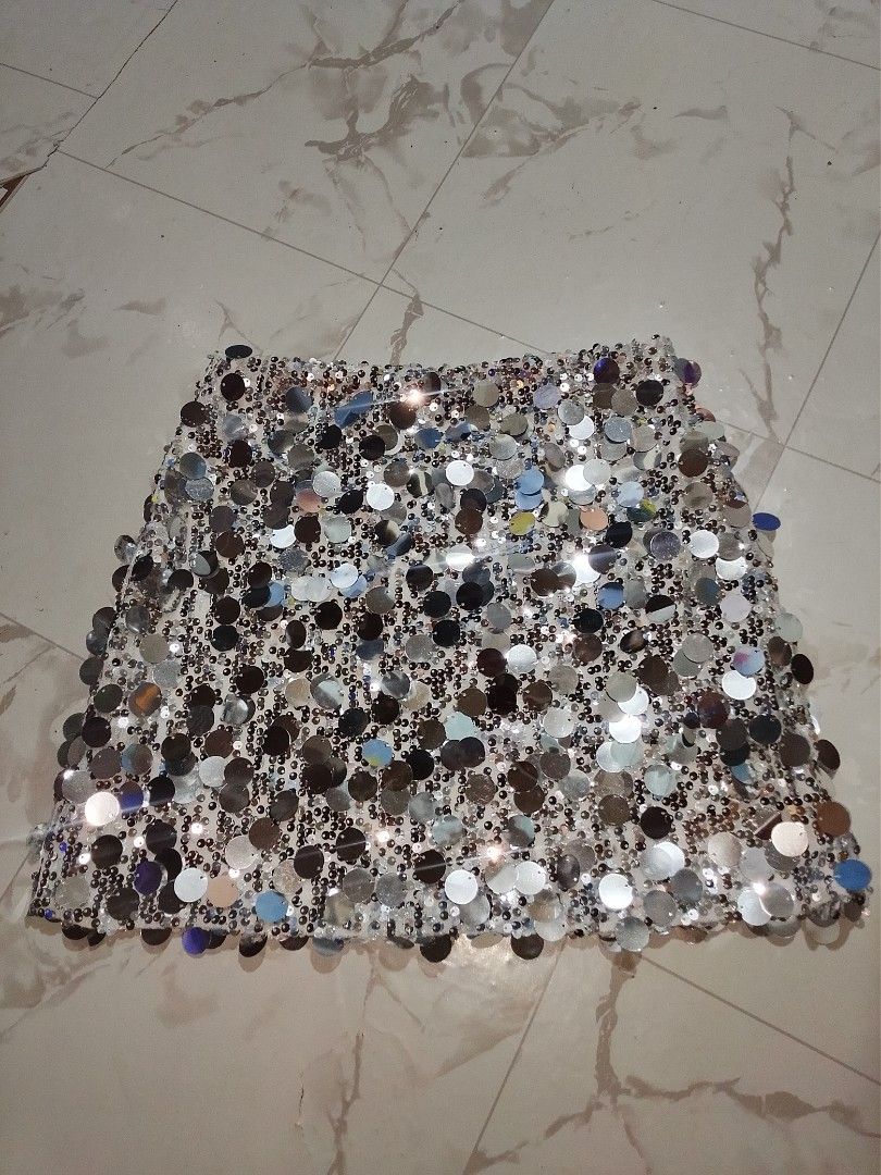 Miskay Silver Sequin Crop Top and Skirt Set (Category: Sets or Coordinates) located in Manila. Submitted by star_closet_ (Listing ID 1470195934, Image 2). Description: - Brand: Miskay (original tag still attached) - Set includes: Matching crop top and skirt - Material: Covered entirely in shiny round silver sequins - Top details: Chic chain straps and exposed back zipper - Occasion: Ideal for parties, nights out, and special events.