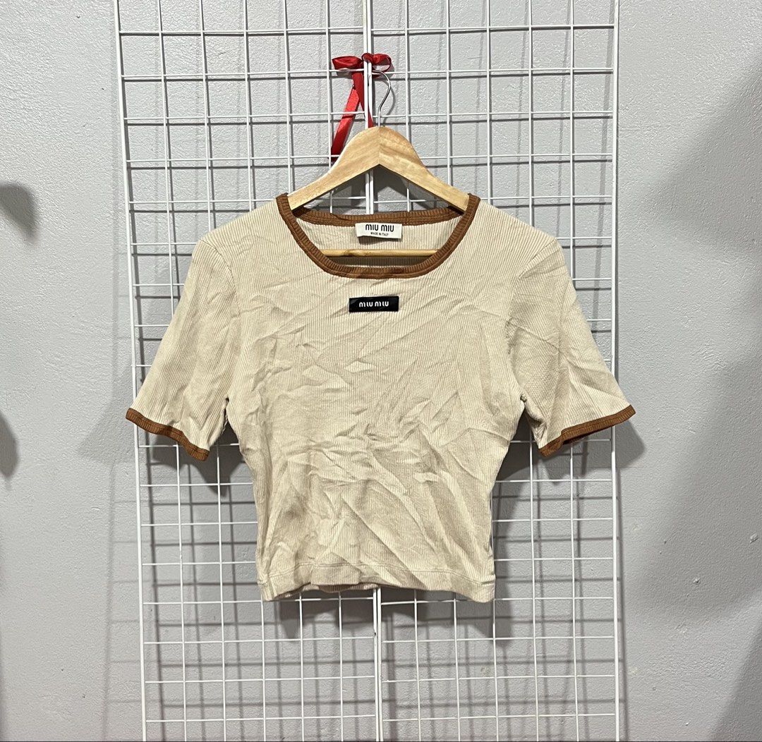 Miu Miu Knit Crop Tee (Category: Luxury Apparel) located in Tuguegarao City. Submitted by preowned_curation (Listing ID 1470055509, Image 1). Description: Beige in color Size 38 (19x15.5) Stretchable fabric Flawless 999 + SF.