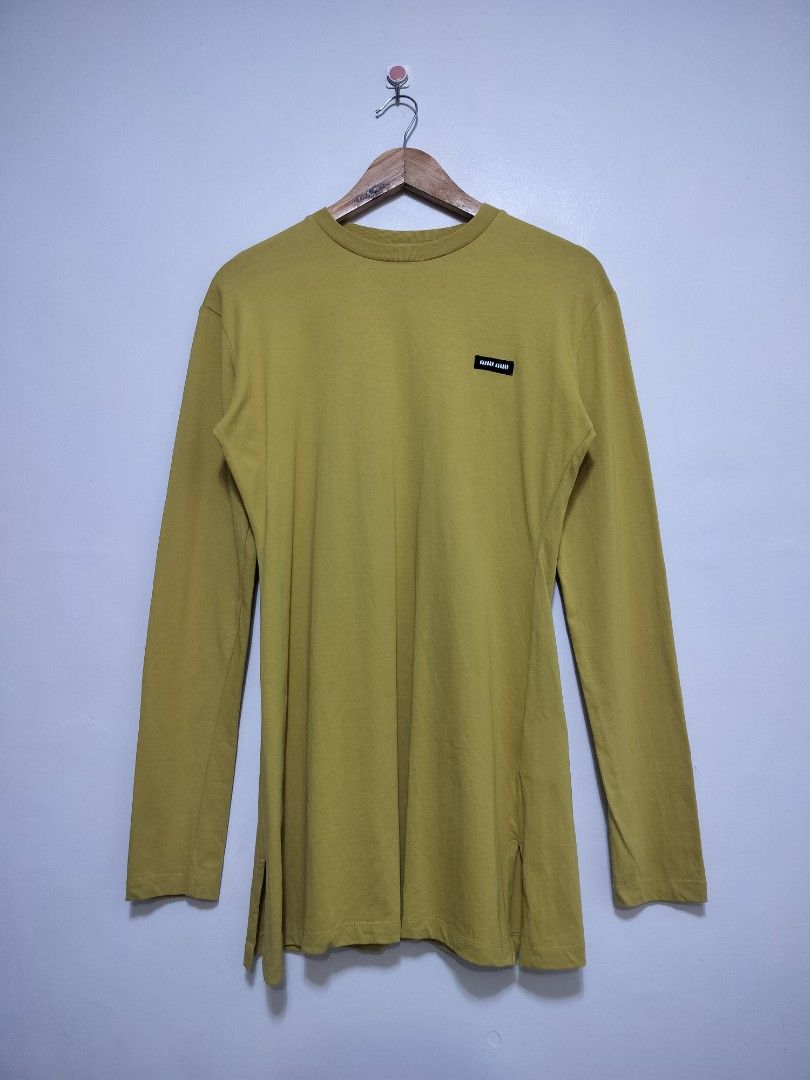 Miu Miu Patch Logo Longsleeve (olive) (Category: Longsleeves) located in Taguig. Submitted by thriftybounce (Listing ID 1470248173, Image 1). Description: Fit : S-L Width : 19 Length : 29.5 Color Rate : 9.8/10 Issue : None.