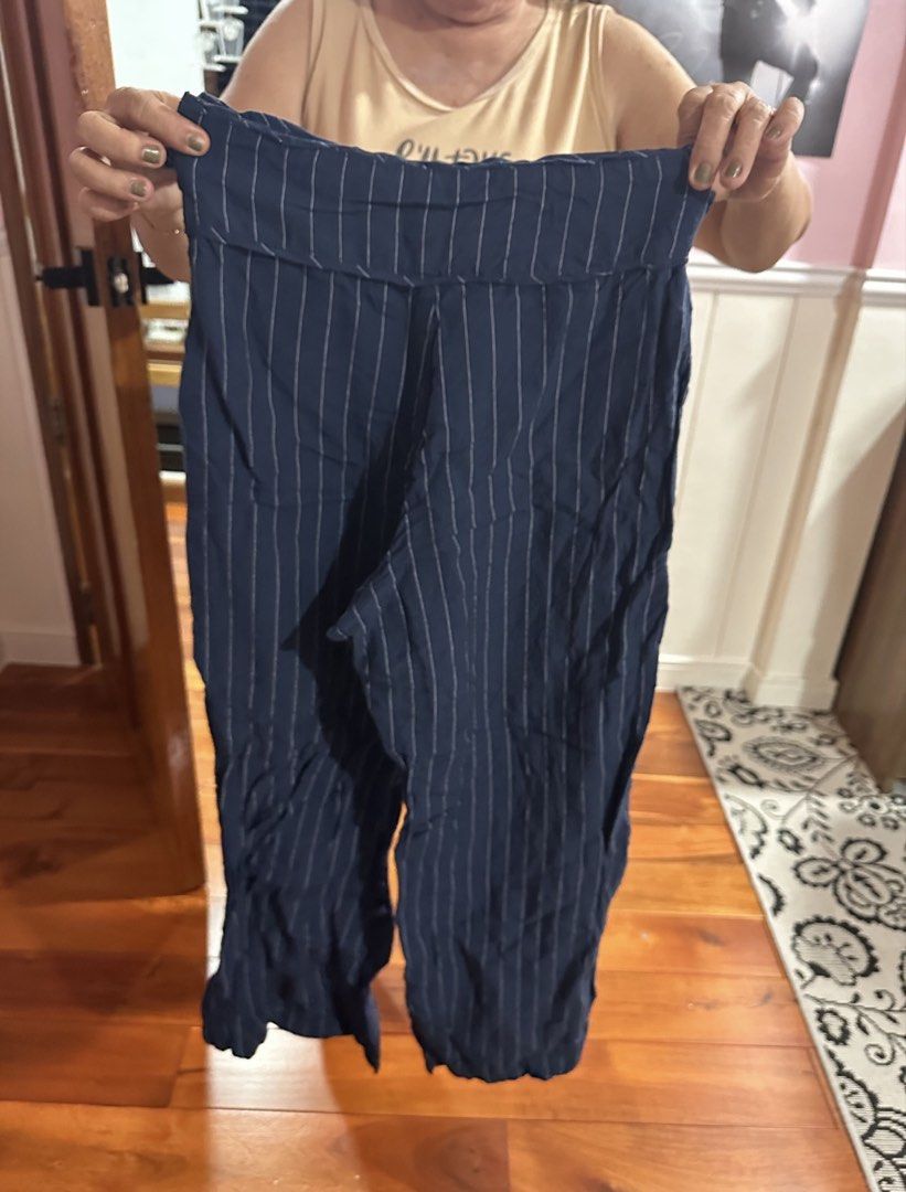 Miu the Label Cairo Pants (Pinstripe) (Category: Other Bottoms) located in Quezon City. Submitted by japfoodl0ver (Listing ID 1470176431, Image 2). Description: - used once - tie around waist is missing - for reference - i have 25inch waist and it fits perfectly - price is firm.