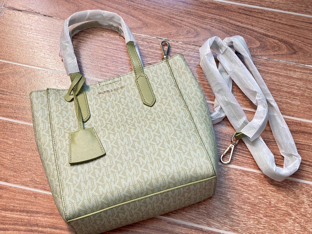 MK Green 2 way bag Medium Size (Category: Shoulder Bags) located in Pasay City. Submitted by mgalv (Listing ID 1470347027, Image 1). Description: MK Print only Mariela Kaleo Brand Handbag or Sling bag or Shoulder bag.
