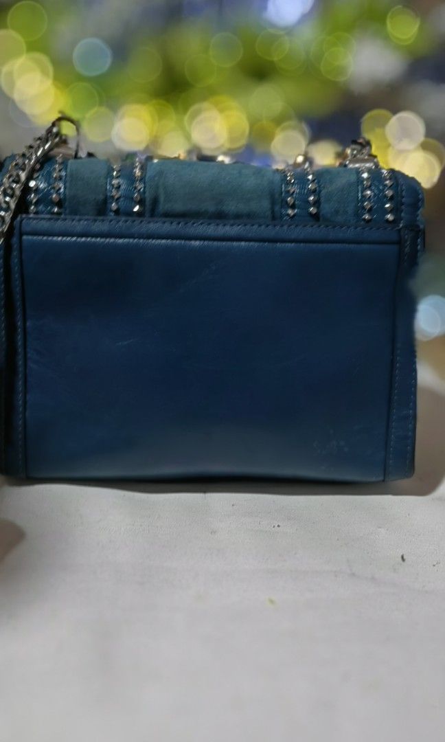 Mk studded (Category: Cross-body Bags) located in Bacolod City. Submitted by darriebags88 (Listing ID 1470151266, Image 2). Description: suede and.leather.combo small silver hardware complete studs.