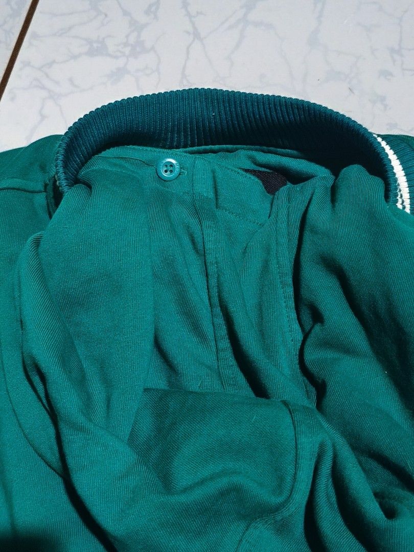 MLB Boston Red Sox Hooded Varsity Jacket 13Y/155 (Category: Babies & Kids Fashion) located in Cebu City. Submitted by bimsai (Listing ID 1470282565, Image 3). Description: 19.5 x 22 - Authentic MLB Boston Red Sox varsity jacket in green and white - Features a cozy hood and quilted green inner lining - Snap-button front closure with striped ribbed cuffs and hem - White faux leather sleeves with a cool Boston Fenway Park patch on the right arm - Si