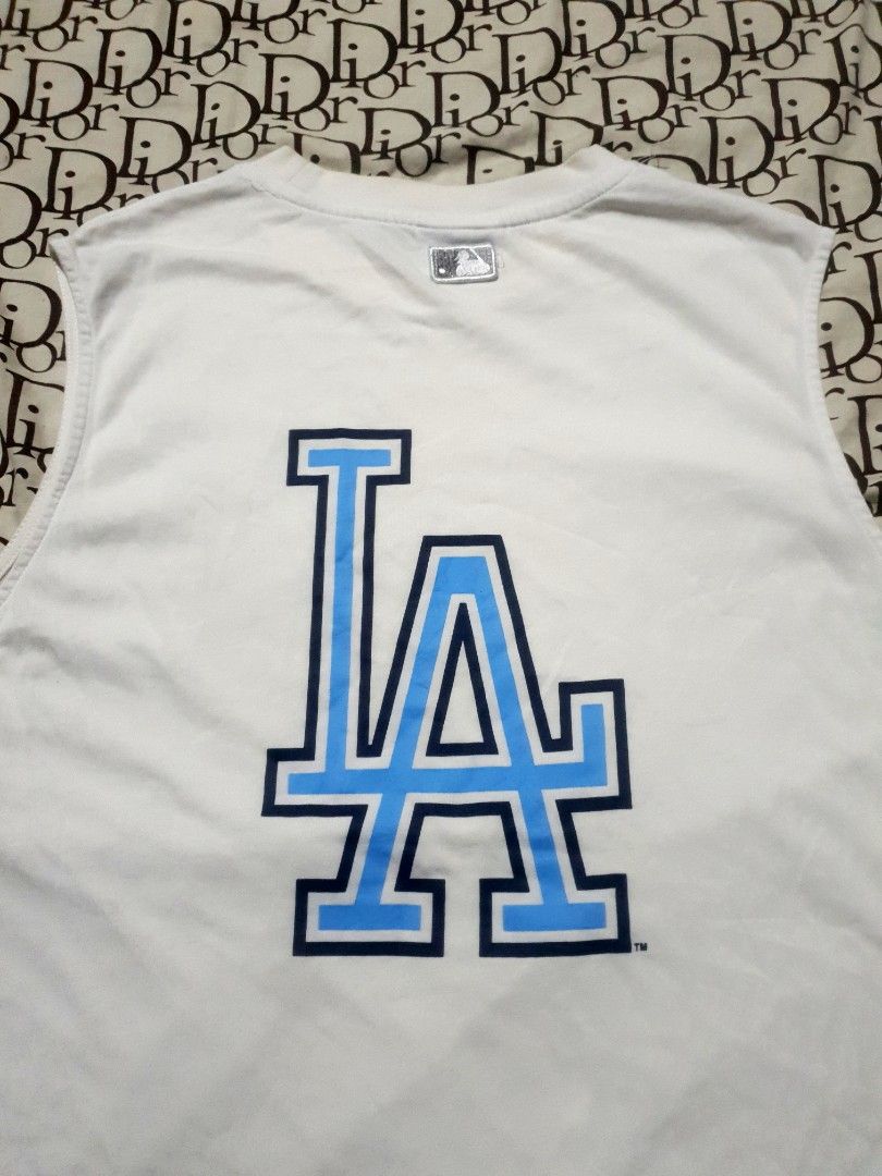 MLB LA dodgers big logo tank top sando (Category: Tshirts & Polo Shirts ) located in San Fernando. Submitted by retro.district. (Listing ID 1470347521, Image 2). Description: - MLB LA dodgers Tank top sando - Size: Medium(21x26) - Condition:Excellent - No issue.