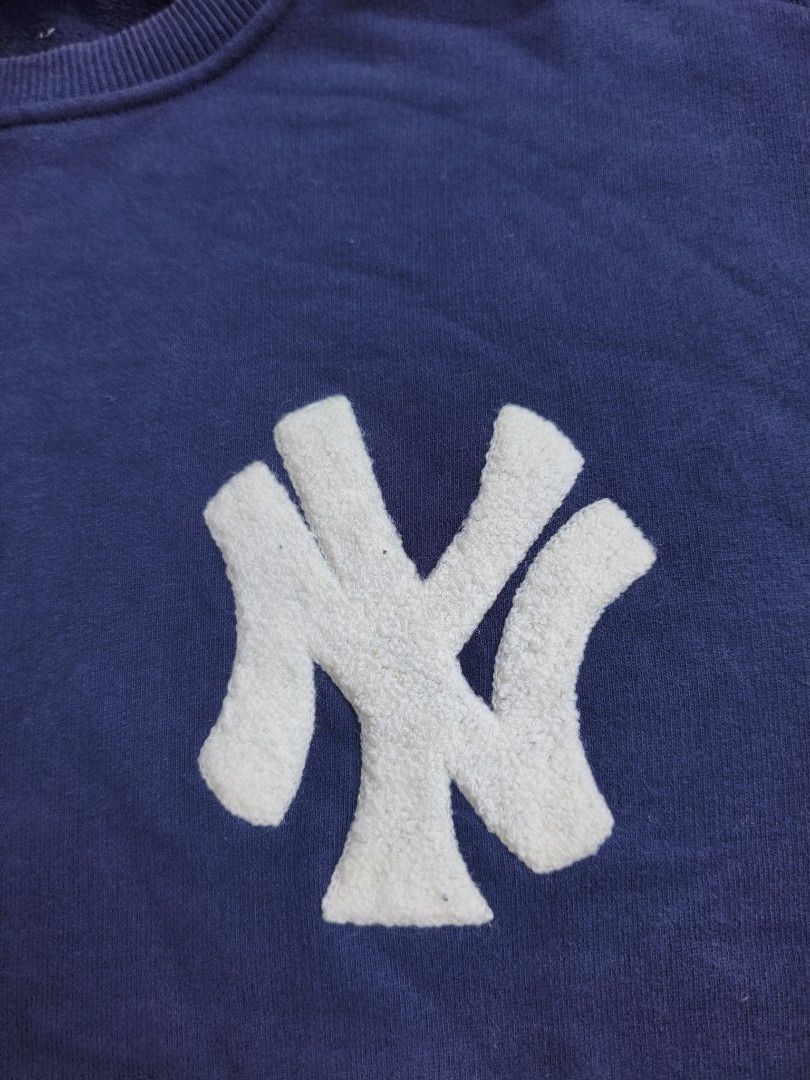MLB New York Yankees Blue Sweatshirt (Category: Coats, Jackets and Outerwear) located in Davao. Submitted by simonandre53791 (Listing ID 1470253030, Image 3). Description: - Authentic MLB blue sweatshirt with large embroidered New York Yankees chest logo - Cozy soft fleece interior lining for ultimate warmth and comfort - Ribbed cuffs and hem for a snug, secure fit - Features stylish branded tape along the inner neckline - Wash care tag attached;