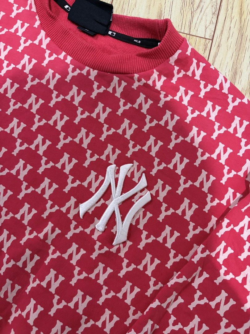 MLB New York Yankees Monogram Sweatshirt Red Size M (Category: Coats, Jackets and Outerwear) located in Caloocan City. Submitted by jerichotad22965 (Listing ID 1470195995, Image 2). Description: - Authentic MLB New York Yankees crewneck sweatshirt - Vibrant red color with all-over white NY monogram print - Raised embroidered NY team logo patch on the chest - Ribbed collar, cuffs, and hem for a secure fit - Size M with genuine merchandise label at