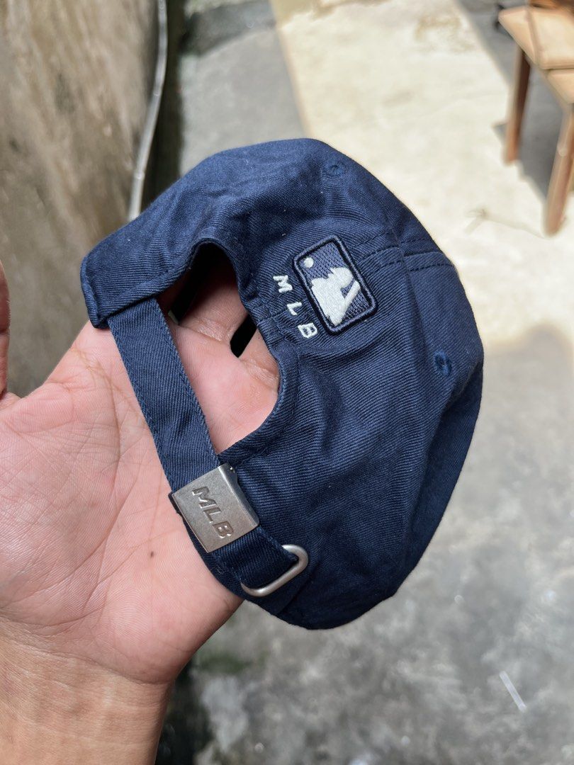 MLB New York Yankees Navy Blue Baseball Cap (Category: Caps & Hats) located in Manila. Submitted by thrifttika (Listing ID 1470225819, Image 1). Description: - Color: Navy Blue - Team: New York Yankees (White embroidered logo) - Style: Classic dad hat - Fit: Adjustable strap with branded metal clasp - Details: Interior branded taping and tags - Condition: Brand new / Excellent.