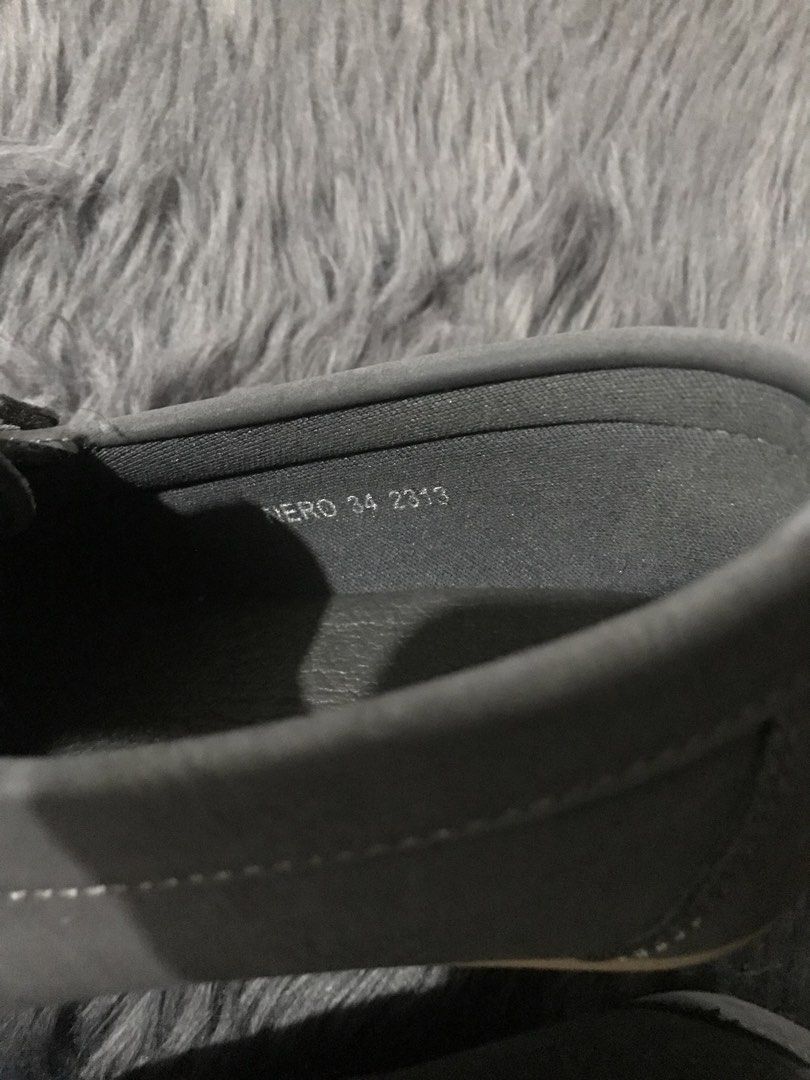 MMF Penny Loafers Grey Size 34 (Category: Babies & Kids Fashion) located in Paranaque City. Submitted by 1tsmerach (Listing ID 1470168792, Image 2). Description: MMF brand loafers in grey, size 34. Classic slip-on moccasin style with penny keeper strap across the top. Rubber pebble sole for good grip while walking. Neat contrast stitching around the toe seam. Inside collar shows code NERO 34 2313. Clean soles with minimal wear marks. BDO, BPI dep