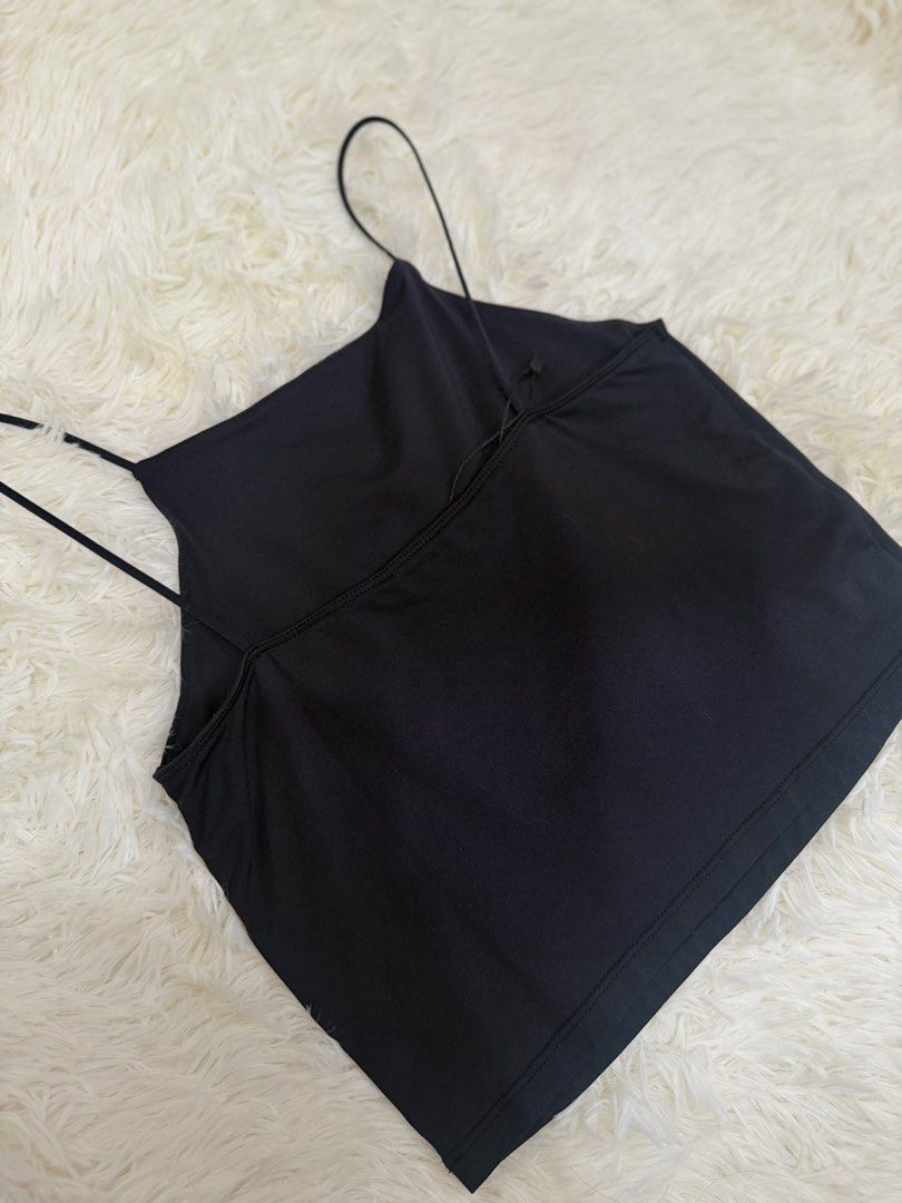 MNG Mango Black Cami Tank Top Size M (Category: Sleeveless) located in Cebu City. Submitted by gdcebu (Listing ID 1470329328, Image 2). Description: - Brand: MNG - Color: Classic Black - Size: M (True to size) - Material & Origin: Made in Turkey - Condition: Clean piece with tag attached - Design: Square neckline with spaghetti straps - Versatile staple for layering or standalone wear.
