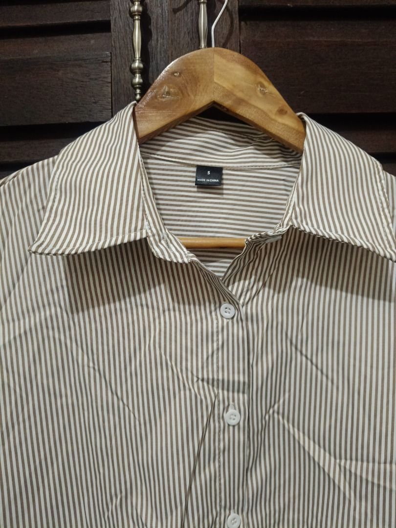 Mocha Brown White Striped (Category: Others Tops) located in Manila. Submitted by byjrb (Listing ID 1470201780, Image 1). Description: Size Small on Tag Pero fit sya sa Large to XL With tali sa likod. Ganda nito! 550+ sa app.