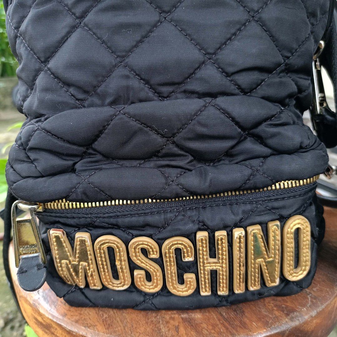 Moschino Nylon backpack (Category: Backpacks) located in Barugo. Submitted by green.trendsetter (Listing ID 1470241731, Image 3). Description: PRELOVED MEANS PRELOVED. Each piece has been previously loved and may naturally have signs of use such as creasing, scratches, stains, discoloration, or other imperfections. Kindly manage your expectations accordingly. •We kindly ask for no fussy buyers. • Photos of bag’s details and other identifying feat