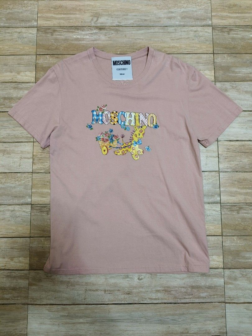 Moschino shirt (Category: Shirts) located in Siniloan. Submitted by talktotheroses (Listing ID 1470295215, Image 1). Description: unisex no issue.