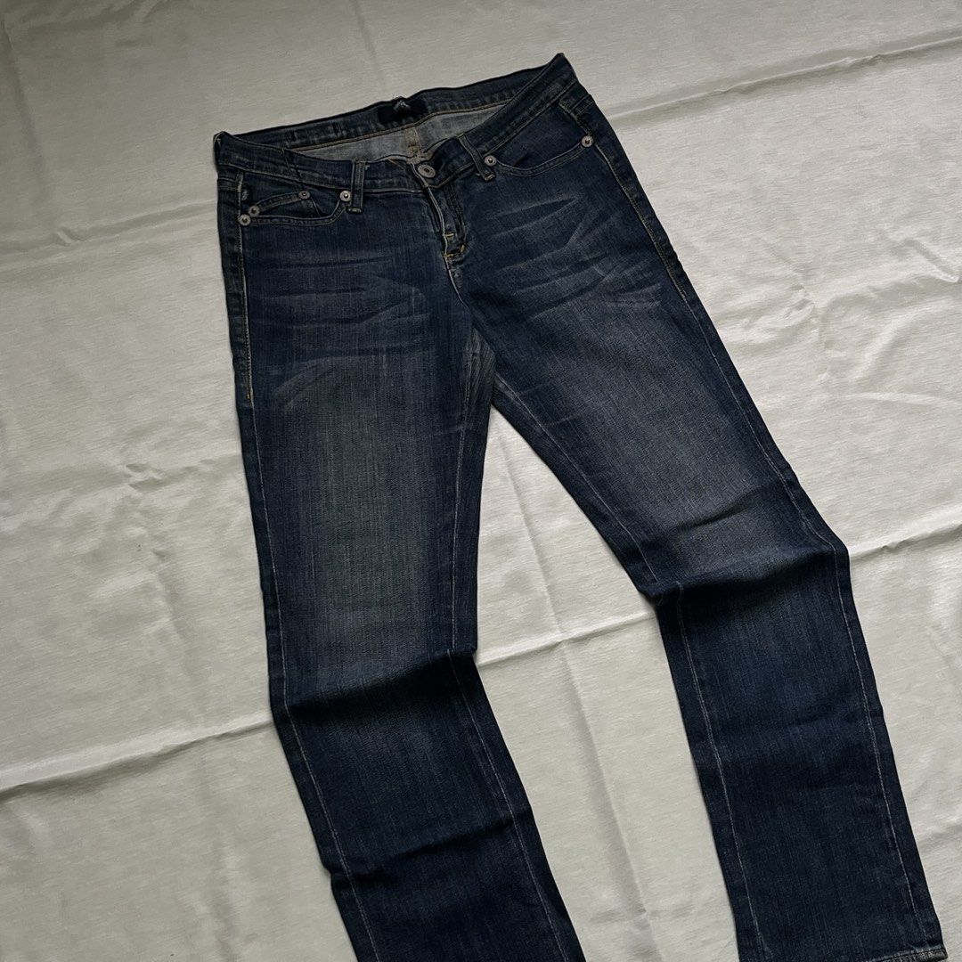 Mossimo Dark Wash Denim Jeans (Category: Jeans) located in Dasmarinas. Submitted by minx203 (Listing ID 1470300387, Image 2). Description: - Brand: Mossimo - Wash: Dark wash - Fit: Mid-rise with zip fly and belt loops - Material: Sturdy fabric with a bit of stretch - Details: Contrast yellow stitching, front pockets with mini coin pocket, and embroidered back pockets - Condition: Great staple piece for casual everyday wear - Location: Ships from 