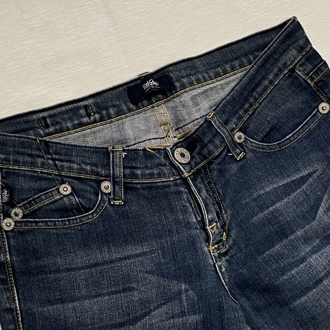 Mossimo Dark Wash Denim Jeans (Category: Jeans) located in Dasmarinas. Submitted by minx203 (Listing ID 1470300387, Image 3). Description: - Brand: Mossimo - Wash: Dark wash - Fit: Mid-rise with zip fly and belt loops - Material: Sturdy fabric with a bit of stretch - Details: Contrast yellow stitching, front pockets with mini coin pocket, and embroidered back pockets - Condition: Great staple piece for casual everyday wear - Location: Ships from 