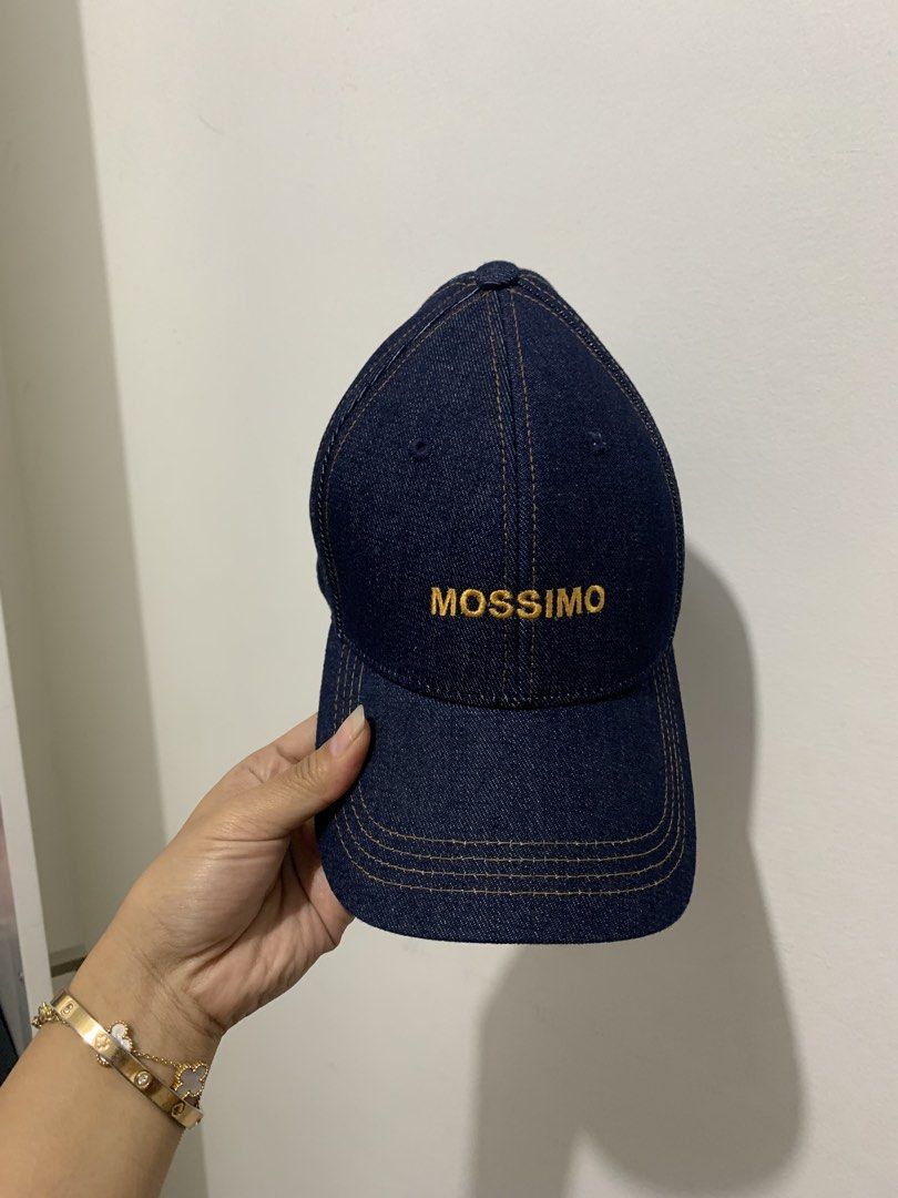 Mossino Dark Blue Denim Baseball Cap (Category: Caps & Hats) located in Manila. Submitted by seasalt.000 (Listing ID 1470160016, Image 1). Description: - Brand: Mossino - Color: Dark blue denim with yellow embroidered logo lettering - Details: Contrast stitching throughout and branded interior seam taping - Closure: Adjustable metal strap at the back - Fit: Standard adult sizing (fits most) - Condition: Clean interior tag with barcode details inc