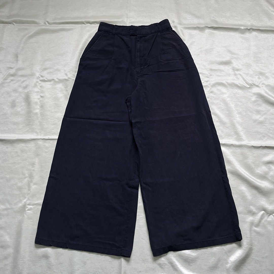 Moussy Black Wide Leg Pants (Category: Jeans) located in Dasmarinas. Submitted by minx203 (Listing ID 1470297830, Image 1). Description: - Brand: Moussy - Color: Classic Black - Material: 90% Lyocell, 10% Linen blend (soft & breathable) - Fit: Wide-leg with elastic waistband at the back for all-day comfort - Details: Front pleats, side pockets, and zip fly with button closure - Origin: Made in China - Perfect for: Office wear or chic casual outfi