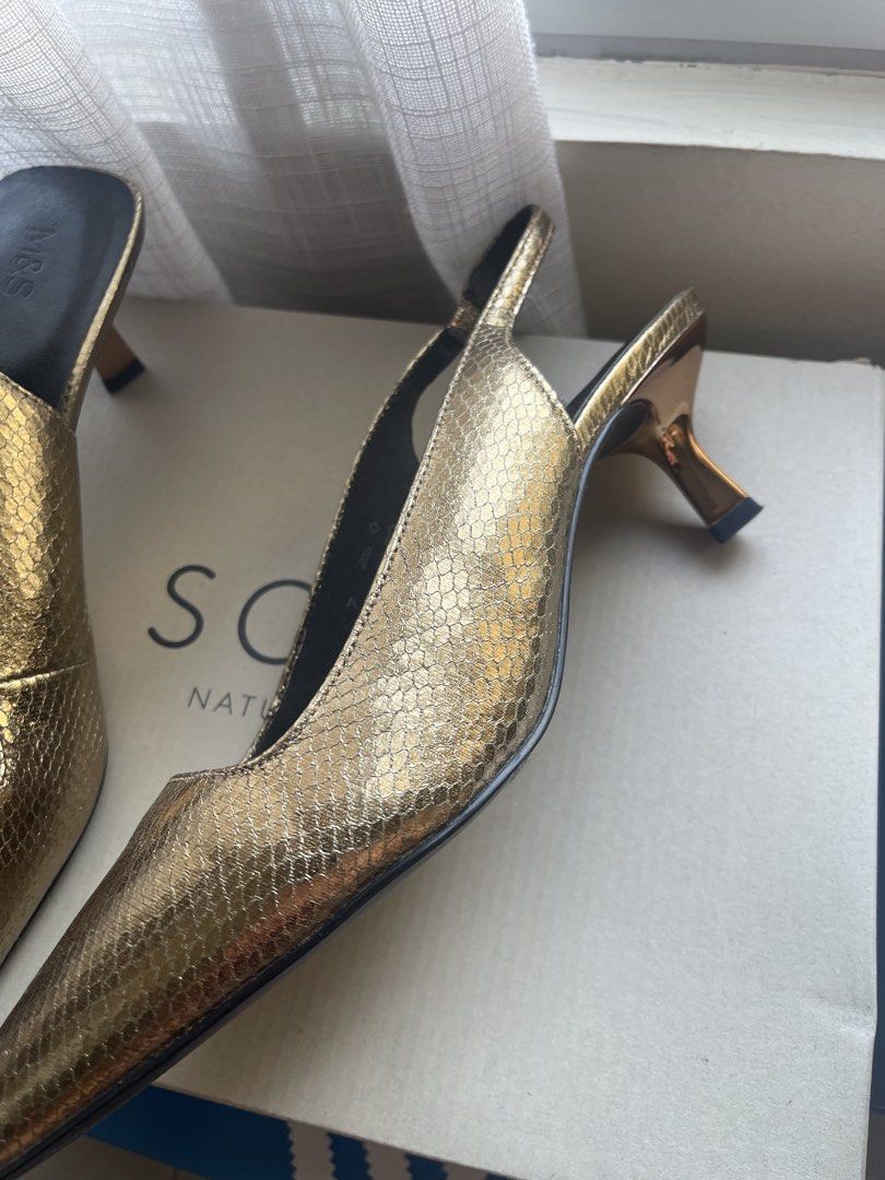 M&S Gold Metallic Pointed Slingback Heels Size 7 (Category: Heels) located in Makati City. Submitted by stephdzn (Listing ID 1470267612, Image 2). Description: - Brand: Marks & Spencer - Style: Pointed toe slingback kitten heels with gold-tone accents - Color/Finish: Metallic gold with a textured snake-effect - Size: UK 7 / EU 40 - Comfort: Built-in Insolia technology for all-day wear - Material: 100% vegan-friendly synthetic materials - Conditio