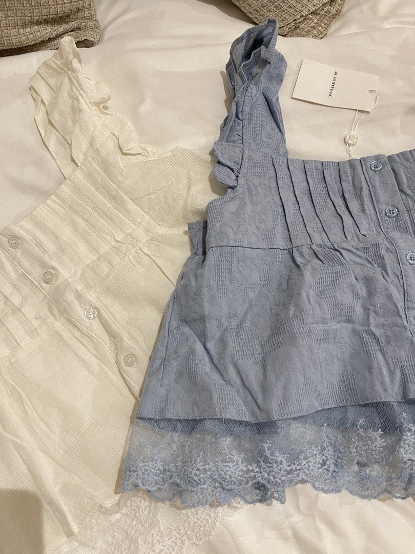 Mt. Matinee Ruffled Top (Category: Sleeveless) located in Quezon City. Submitted by everythingmustgo__ (Listing ID 1470254427, Image 3). Description: Brand new with tags (from BKK) Size: free size Color: white ‼️ firm with price. low ballers will not be entertained ‼️.