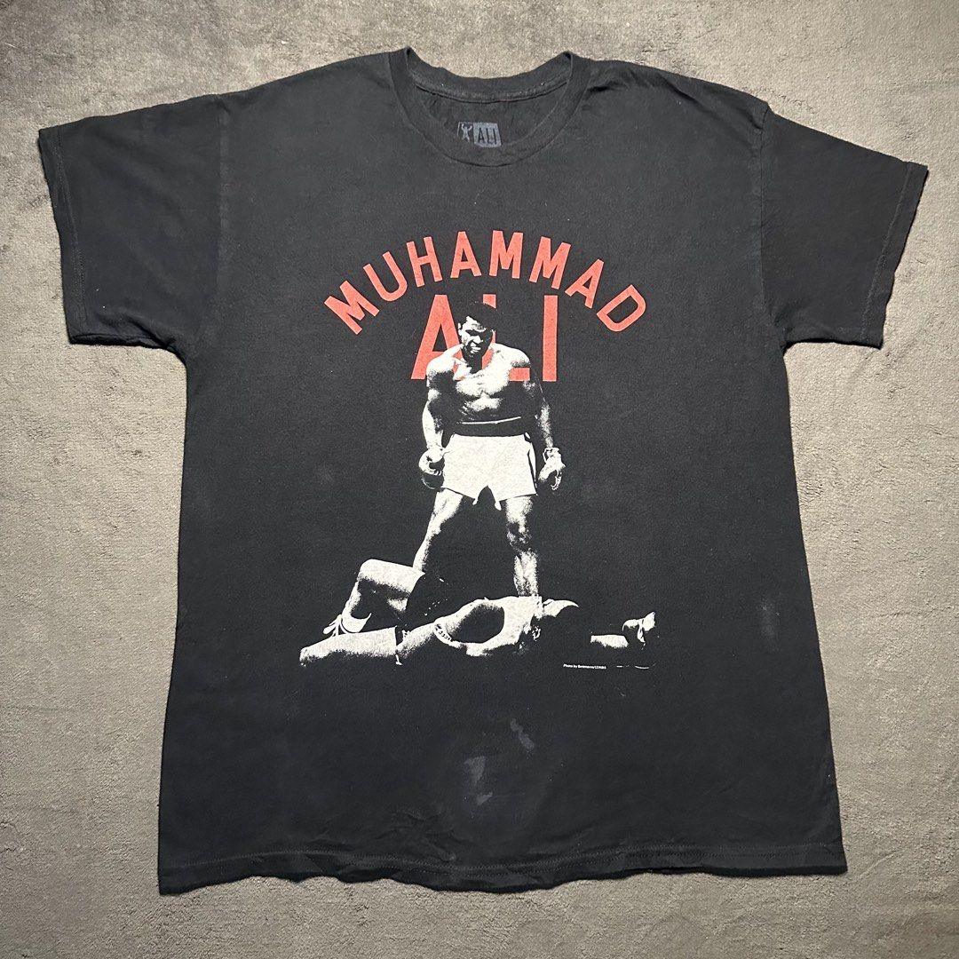 Muhammad Ali Graphic T-Shirt Black Size Large (Category: Tshirts & Polo Shirts ) located in Manila. Submitted by nye.seller (Listing ID 1470296644, Image 1). Description: Large 22x29 Good condition Issue white stain.