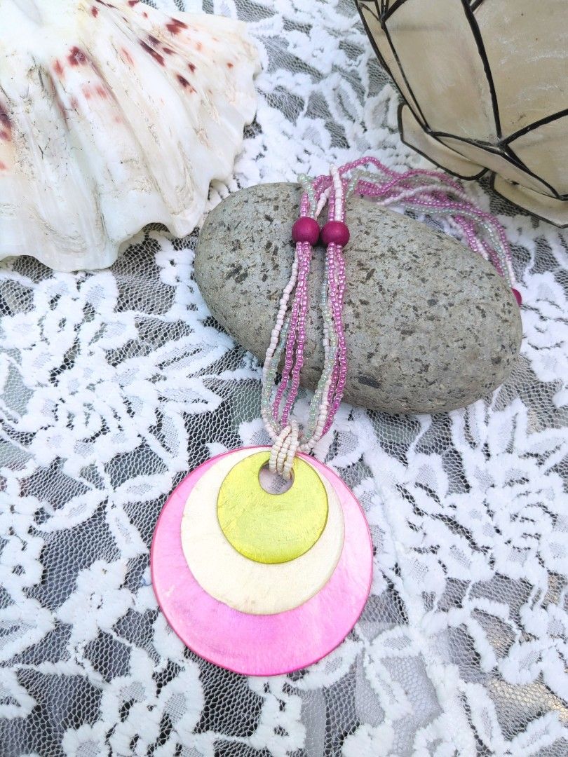 Multilayered Capiz Shells V2 Handcrafted Necklace (Category: Necklaces) located in Las Pinas. Submitted by amisells (Listing ID 1470224698, Image 3). Description: ⋆⊱༻𖥸༺⊰⋆ every piece in our collection is thoughtfully handcrafted using an exquisite selection of locally sourced natural materials! discover the beauty of authentic craftsmanship through coconut heishi beads, lumbang seed beads, bayong and gmelina wood beads, coco side-drill beads, on