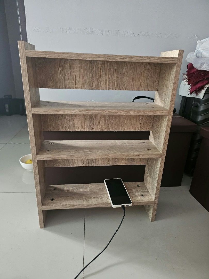 Multi-Tier Wooden Mini Shelf / Organizer (Category: Shelves, Cabinets & Racks) located in Valenzuela. Submitted by justgorjas (Listing ID 1470298568, Image 2). Description: Original SRP: 850 php namin nabili kReference: (Note: Phone placed on the bottom shelf for size scale) para makita niyo estimated size. - light natural oak wood laminate finish - Magandang wood po. Mabigat. - sturdy, fully assembled, and intact pa Lalamove pooling only, check 