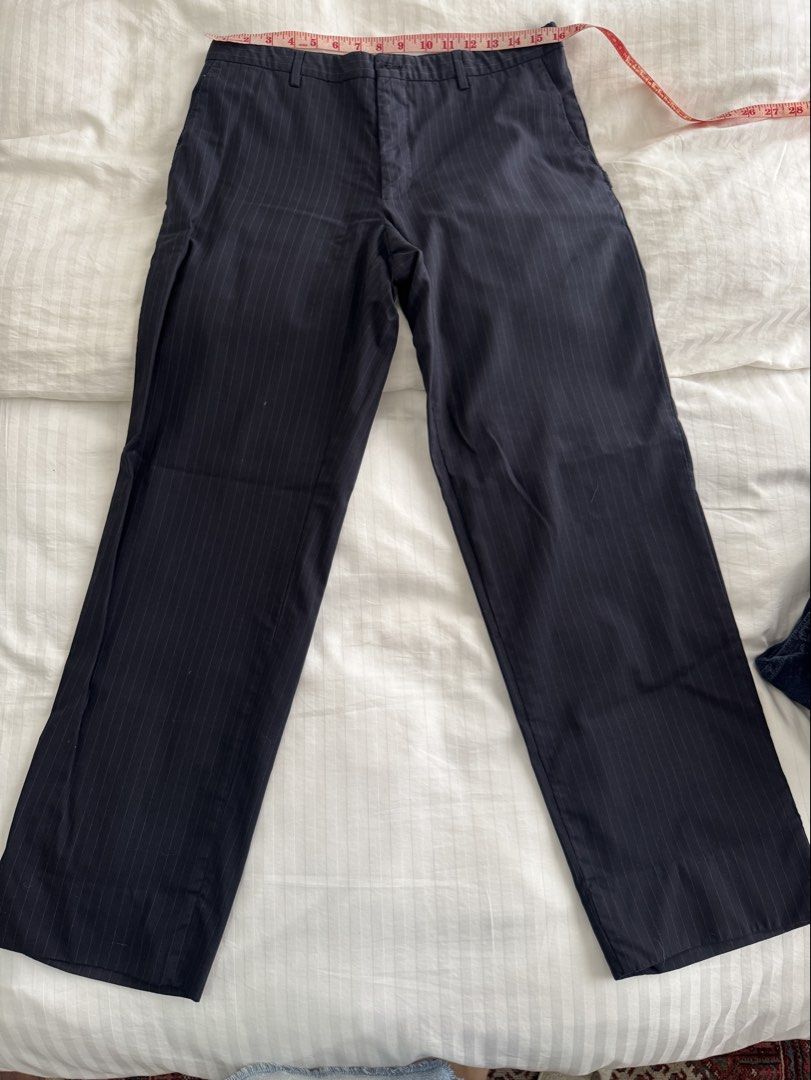 Navy Pinstripe Mid waist Trousers (Category: Other Bottoms) located in Manila. Submitted by ramoneybaloney (Listing ID 1470193608, Image 1). Description: Measurements: Waist - 32” Rise - 10” Thigh - 22” Hips - 40” Has rips on the pockets but sewed them up, doesn’t affect function and not obvious when worn.
