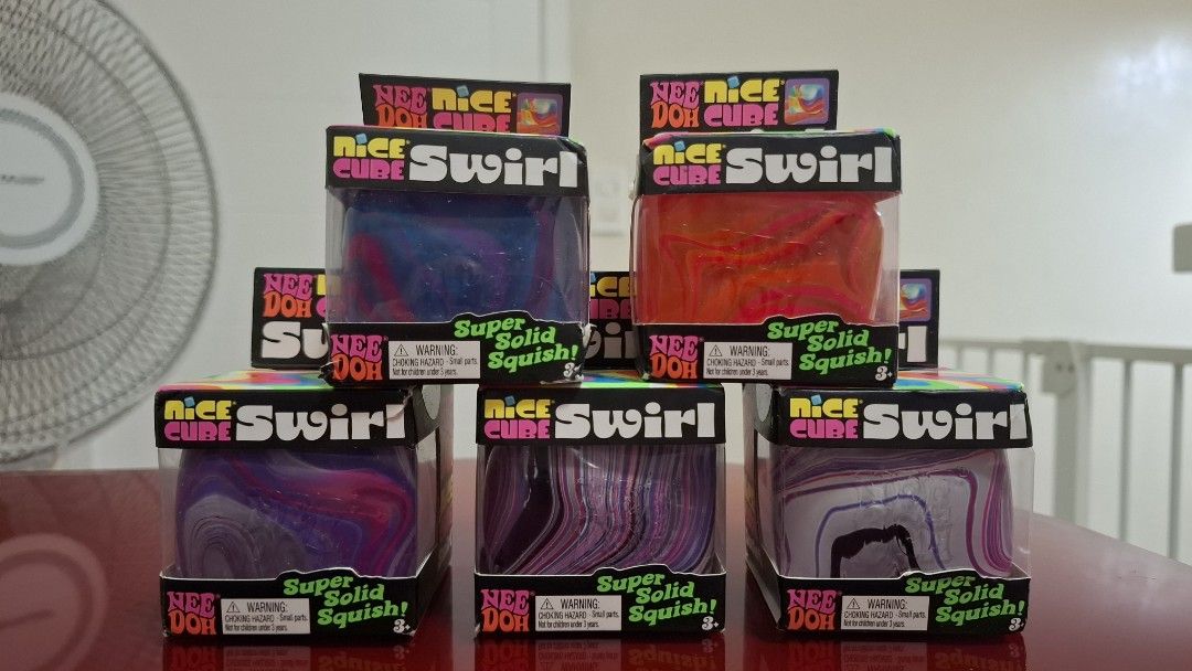 NeeDoh Nice Cube Swirl Super Solid Squish Fidget Toy (Category: Kids Toys) located in Pasay City. Submitted by mshannahpi (Listing ID 1470243143, Image 1). Description: - Authentic NeeDoh Nice Cube Swirl fidget toys - Super solid and satisfying squish texture - Multiple colorful marbled swirl designs to choose from - Brand new in original packaging boxes - Perfect for gifting, collecting, or stress relief.