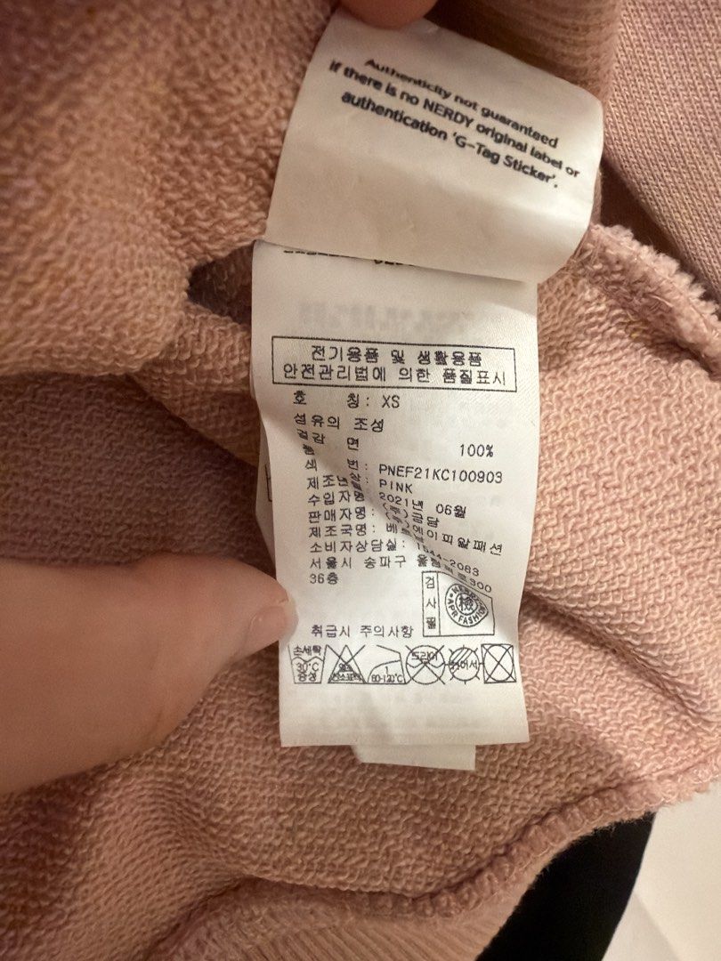 Nerdy pullover (Category: Longsleeves) located in Singapore. Submitted by sl_3715 (Listing ID 1470247799, Image 3). Description: - Brand: NERDY - Item: Pullover / Sweatshirt - Color: Pink with white sleeve taping and chest logo - Size: XS (100% Cotton) - Condition: Excellent pre-loved condition - Features: Soft interior, stylish streetwear aesthetic .