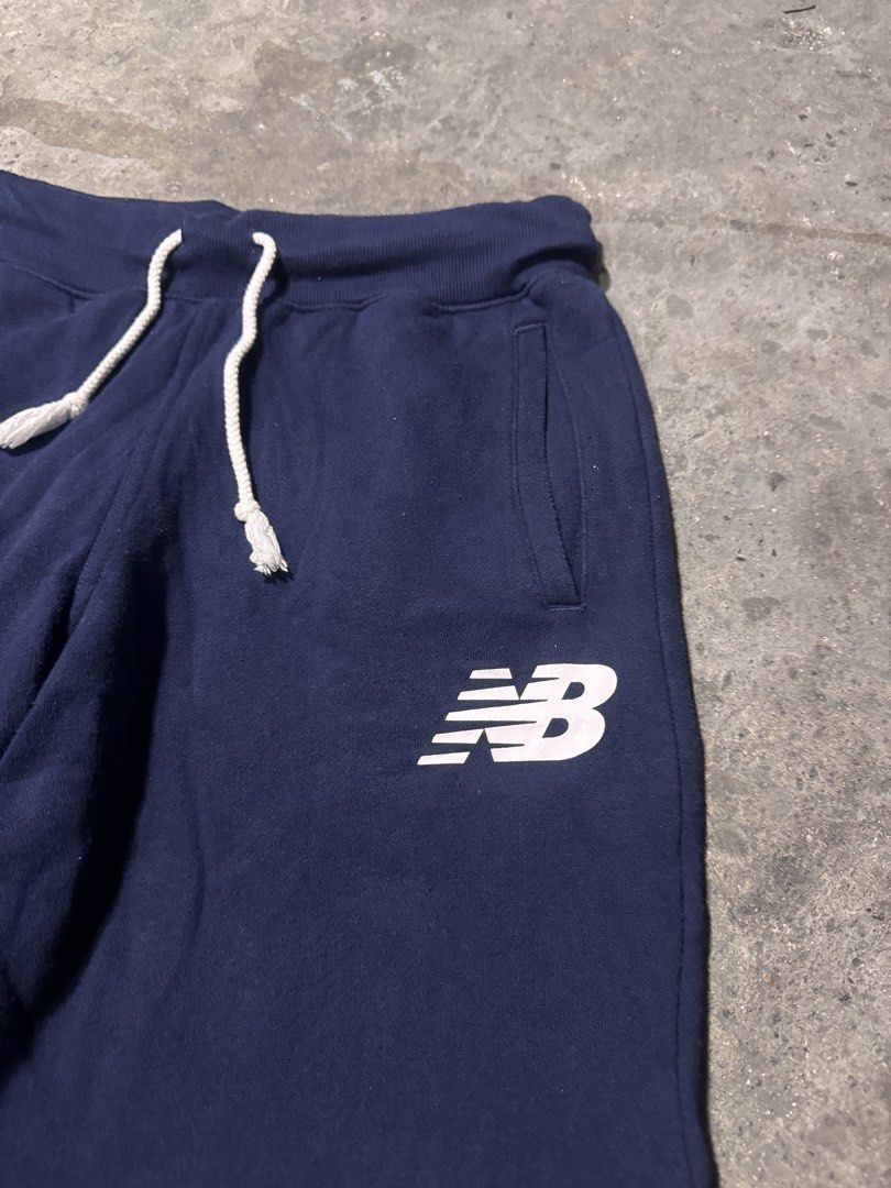New balance dark blue short (Category: Shorts) located in Pasig City. Submitted by dripthrift1600 (Listing ID 1470319092, Image 3). Description: - New Balance Dark Blue short - Good condition - Issue: None - Sizes: L - Dimes: 28x18.