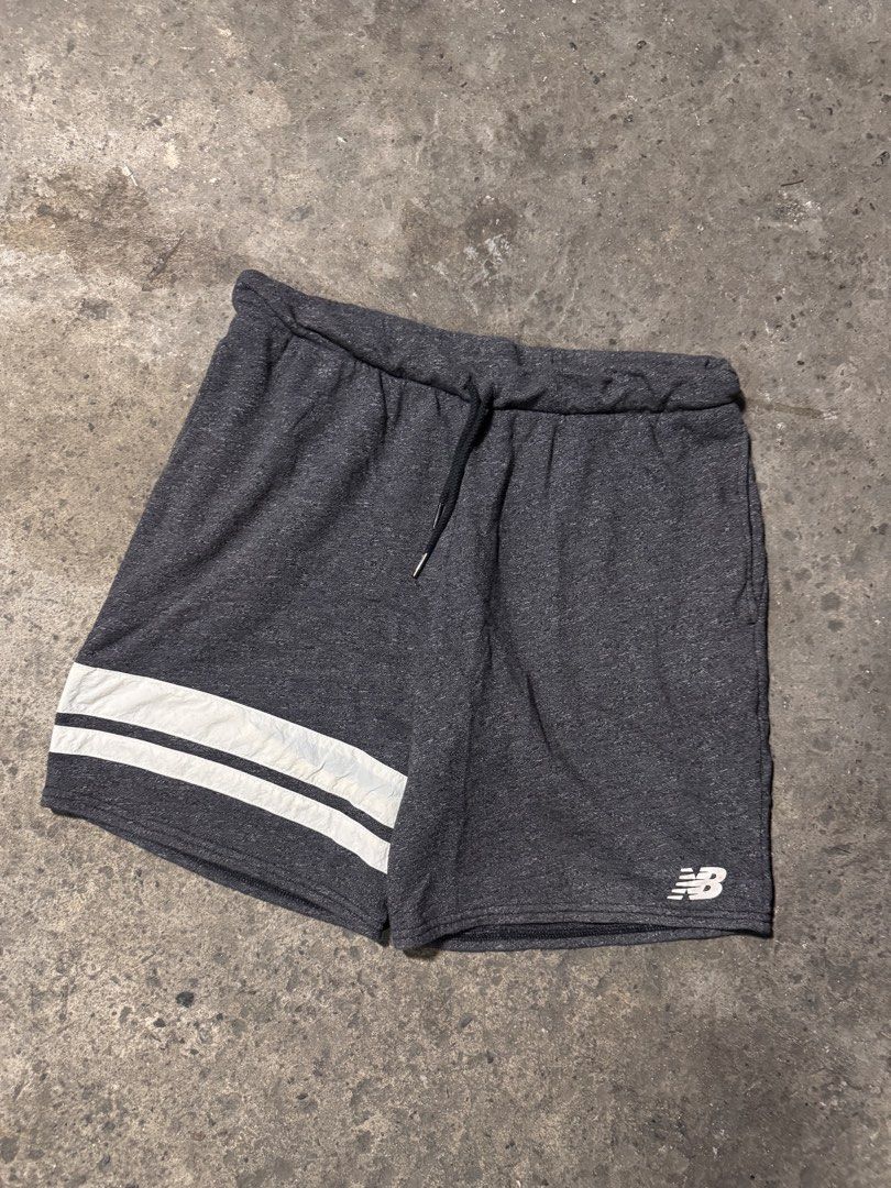 New Balance dark grey short (Category: Shorts) located in Pasig City. Submitted by dripthrift1600 (Listing ID 1470319672, Image 1). Description: - New balance grey short - Good condition - Issue: None - Sizes: M - Dimes: 32x17.