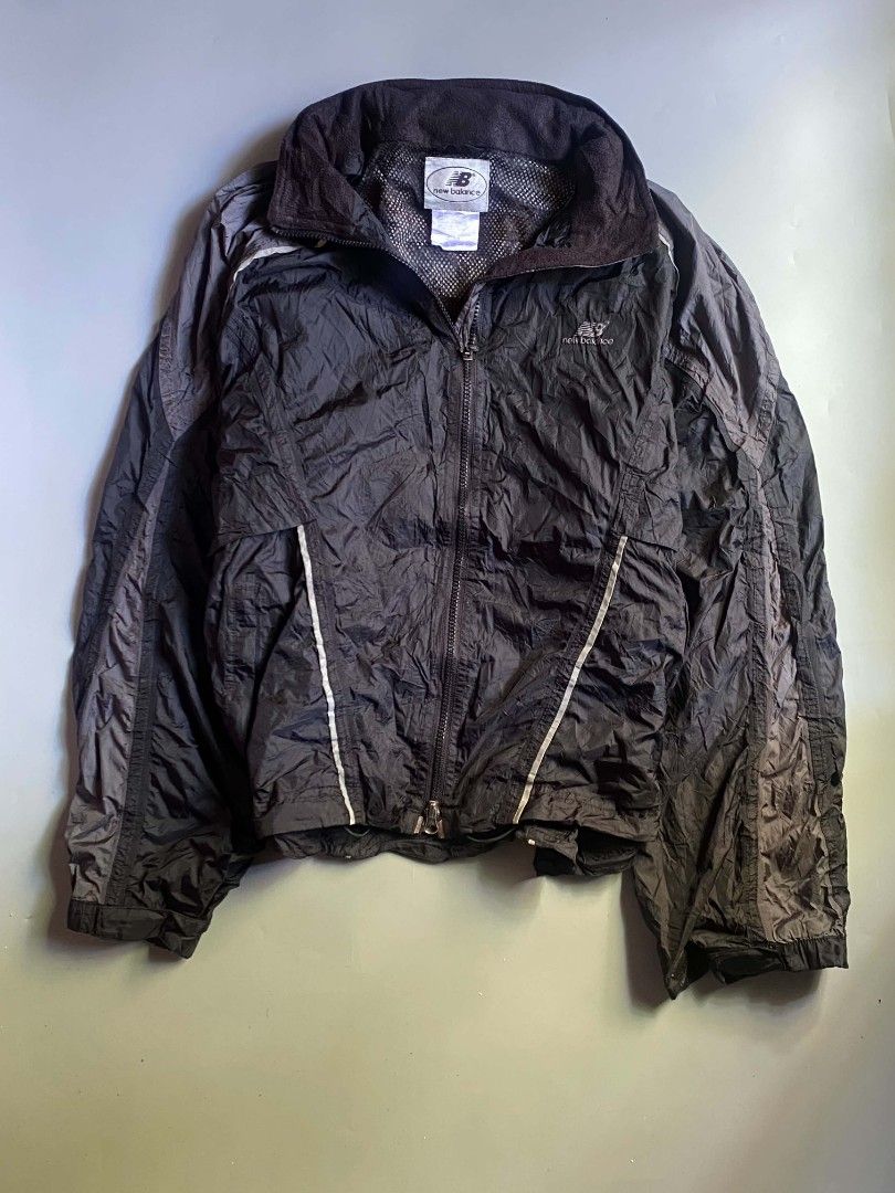 New Balance hooded windbreaker (Category: Coats, Jackets and Outerwear) located in Angeles City. Submitted by ian.thrift_ph (Listing ID 1470185501, Image 2). Description: Fresh from bale W 26 L 25 Boxy Fit Good Condition.