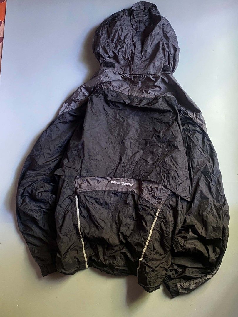 New Balance hooded windbreaker (Category: Coats, Jackets and Outerwear) located in Angeles City. Submitted by ian.thrift_ph (Listing ID 1470185501, Image 1). Description: Fresh from bale W 26 L 25 Boxy Fit Good Condition.
