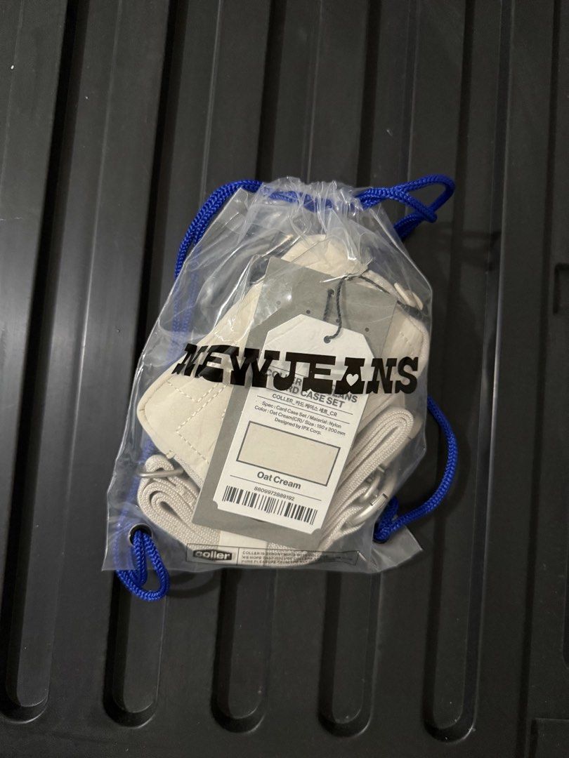 newjeans coller wallet oatmeal cream (Category: K-Wave Merchandise) located in Quezon City. Submitted by switchnin (Listing ID 1470252099, Image 1). Description: brand new with tags.
