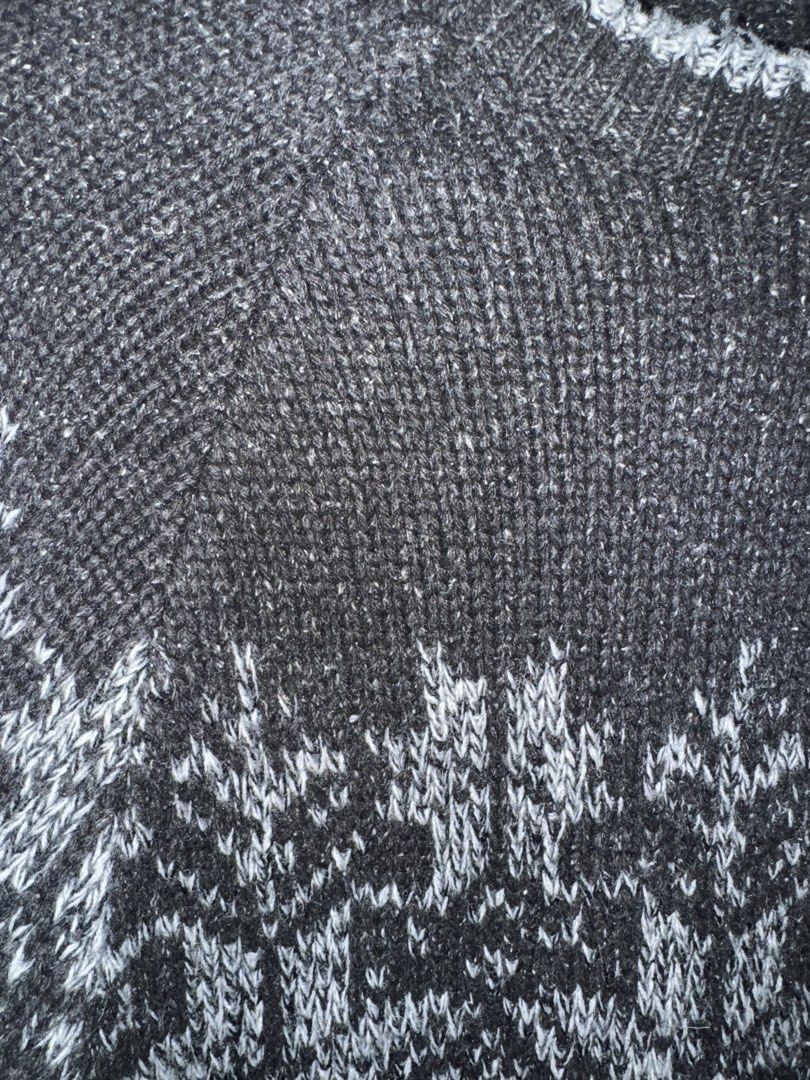 Next Black and Grey Fair Isle Pattern Knit Sweater (Category: Longsleeves) located in La Trinidad. Submitted by prelovedandfindsbyji (Listing ID 1470221442, Image 3). Description: Next knit sweater, size extra small. Black upper section fading into a patterned grey and black snowflake knit body and sleeves. Long sleeves with ribbed crew neck collar. Material blend of acrylic, cotton, wool, and silk. Care tag specifies machine wash on wool cycle i