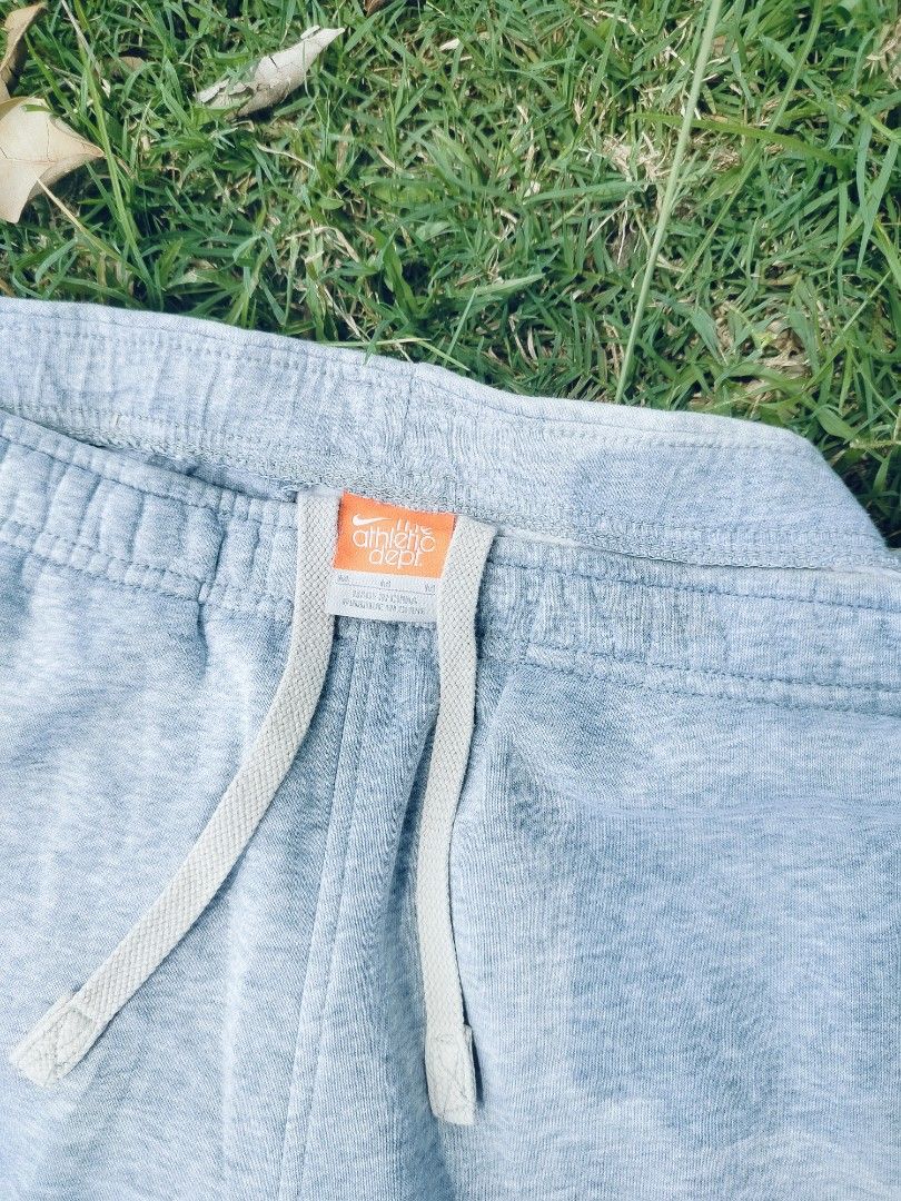 Nike 2000s Athletic Dept. Grey Sweatpants (Category: Activewear) located in General Santos City (Dadiangas). Submitted by gee.7thstreetz (Listing ID 1470181664, Image 2). Description: Mid 2000s Nike Athletic Dept. open-hem fleece sweatpants. Clean every day staple. Dimension in inches L: 38 W: 17 Leg opening: 9.