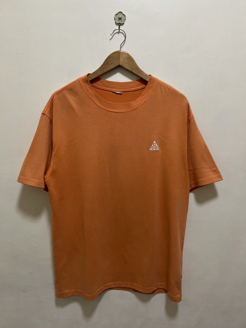 Nike ACG Orange Shirt (Category: Formal Shirts) located in Manila. Submitted by thriftpoint99 (Listing ID 1470247749, Image 1). Description: 22.5x29 Cut necktag Excellent condition Need wash .